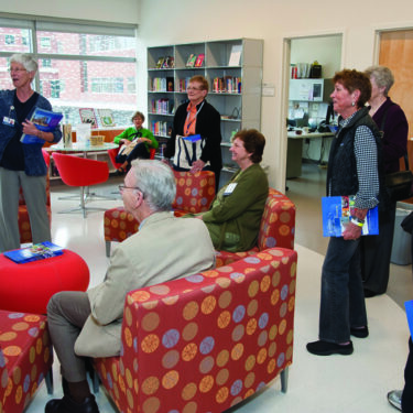 Alumni take tours of new and old areas of the Johns Hopkins Hospital on Friday morning.